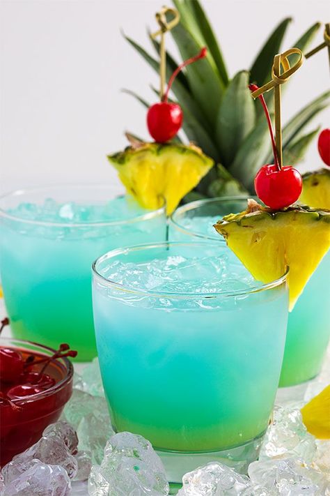 Bluewater Breeze Cocktail - An easy tropical-inspired cocktail with vodka, rum, blue curacao, cream of coconut and pineapple juice! Sweet Alcoholic Drinks, Cream Of Coconut, Coctails Recipes, Blue Drinks, Liquor Drinks, Boozy Drinks, Rum Drinks, Cocktail Recipes Easy, Easy Drinks