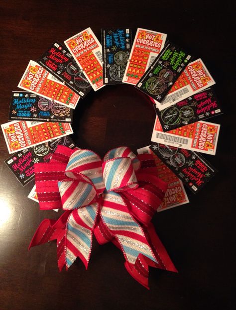 lotto ticket wreath! Christmas Tree Lottery Tickets, Gifting Lotto Tickets, Diy Lottery Ticket Tree, Christmas Scratch Ticket Gift Ideas, Lottery Christmas Tree, Lottery Ticket Wreath Diy, Lotto Ticket Christmas Gift Ideas, Lotto Ticket Bouquet, Lotto Ticket Gift Ideas