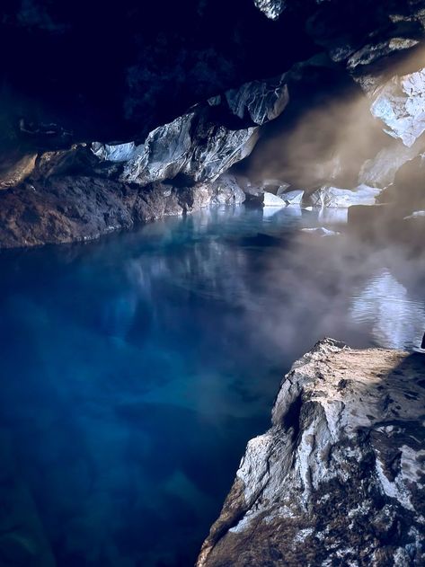 Grjótagjá is a small lava cave located near lake Mývatn in north Iceland, famous for featuring a beautiful geothermal hot spring in its depths. North Iceland, Spring Lake, Book Aesthetics, Hot Spring, Capital City, Book Aesthetic, Hot Springs, Iceland, Springs