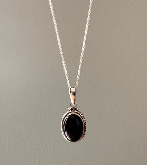 Sterling silver oval black onyx necklace. Also available in other stones. Gift box available for purchase. If you would like your jewellery to arrive in a gift box Search GIFTBOX to purchase. Buy multiple items and only pay for one shipping cost. Etsy Necklaces Unique, Sweet Jewelry, Onyx Pendant, Oval Necklace, Black Onyx Necklace, Witch Jewelry, Indian Jewelry Sets, Onyx Necklace, Dope Jewelry