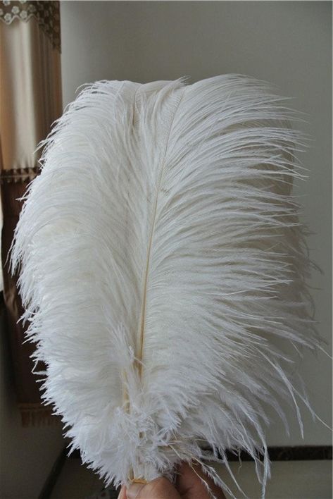 White ostrich feather 100 pcs 5-22inches for wedding party | Etsy White Ostrich Feathers, Feather Party Decor, White Feather Centerpieces, Feathers Decor, Ostrich Feather Centerpieces, Wedding Party Centerpieces, White Party Decorations, Wedding Pen, Feather Centerpieces