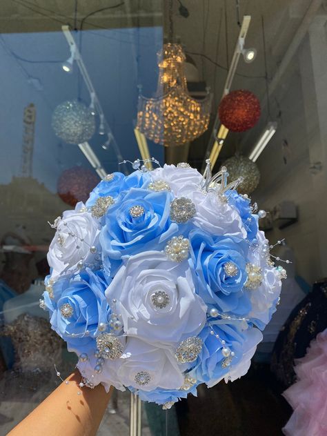 Bahama Blue mixed with White Flowers and silver stones also featuring a mini princess crown. Perfect for your special occasion! Blue And White Bouquet, Quinceanera Blue, Quinceanera Ideas, Quince Ideas, Nails Today, Blue Bouquet, Bahama Blue, Happy Flowers, Photo Makeup