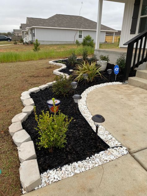 Landscape make over 
White marble stones Outside Mulch Landscaping Ideas, Simple Front Yard Landscaping Ideas With Rocks, Rocks Around Front Porch, Front Of House Rock Landscape Ideas, Half Mulch Half Rock Landscaping, Easy Cheap Front Yard Landscaping, Landscaping Next To Sidewalk, Landscaping Inspo Front Yard, Front Of Deck Landscaping