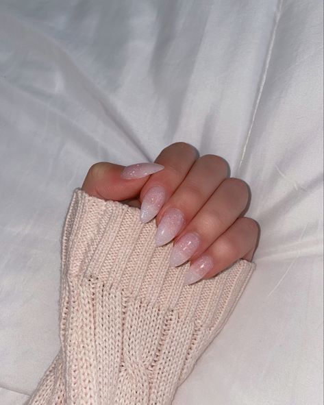 Light Pink Ombre Nails Glitter, Almond Nails Pink Sparkle, Light Pink Sparkly French Tip Nails, Pink Shimmer Almond Nails, Opaque Glitter Nails, Clear Pink Sparkle Nails, Milky Pink Glitter Nails, Light Pink With Sparkles Nails, Clear Light Pink Nails