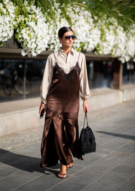 Le Fashion rounds up the top 25 brown dresses you can repurpose all season long. Slip Dress Street Style, Brown Slip Dress, Slip Dress Outfit, Stockholm Fashion Week, Jeans Petite, White Slip Dress, Velvet Clothes, Fall Dress Outfit, Black Slip Dress