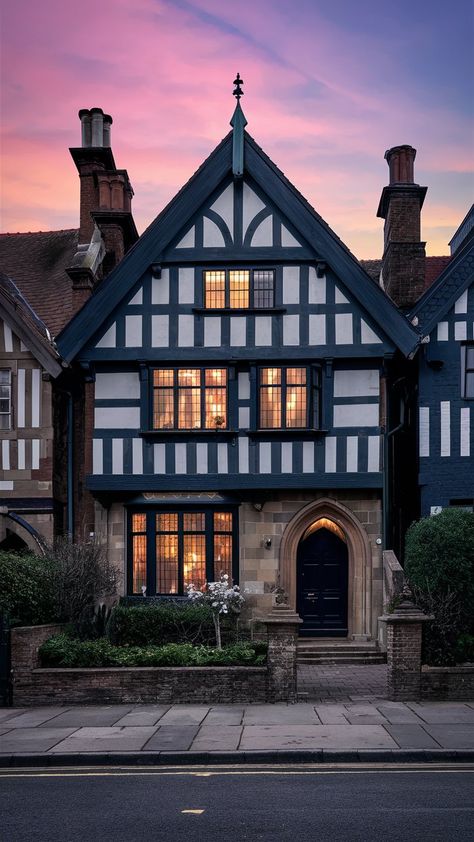 An image showcasing a Tudor-style house, inspiring you to infuse your space with Bridgerton-esque aesthetics. Colorful Tudor Exterior, Tudor Style Homes Floor Plans, Tudor Style House Exterior, Mock Tudor House Exterior, French Home Exterior European Style, English Tudor Exterior, Tudor Revival House Exterior, Small Tudor Style Homes, French Tudor Style Homes