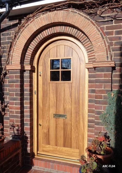 arched oak door Arched Oak Front Door, Wooden Arch Front Door, Arched Front Doors, Arched Exterior Doors, Brick Detailing, Arch Doors, Arched Entryway, Wm Logo, Entrance Wood Door