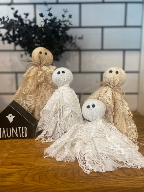 "These lace ghosts will give a touch of shabby chic elegance to your Halloween decor.  They can be used as a bowl filler, or standing displayed on tables, shelves, mantles, tiered trays, etc... You can choose from no stand (bowl filler) or on a dowel and base.   The standing are available in heights of approx 5\" or 7\" tall.  The 5\" will not show the base and with the 7\" you will see the base and part of the stained dowel.  See pictures for examples.    please specify height you would like if Halloween Ghost Centerpiece, White Halloween Decor, Primitive Halloween Ghosts, Fabric Ghosts Diy, Primitive Ghost, Shabby Chic Halloween Decor, Lace Ghost, Orange Paper Craft, Primitive Ghost Bowl Fillers