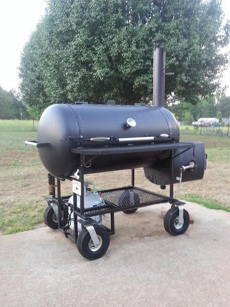 Prolly an 80-120 gallon tanker, not sure about the gas set-up though; Some big ol' hand truck castors though Smoker Bbq Design, Bbq Smokers Build, Best Offset Smoker, Backyard Smokers, Custom Smokers, Smoker Build, Smoker Designs, Custom Bbq Smokers, Diy Smoker