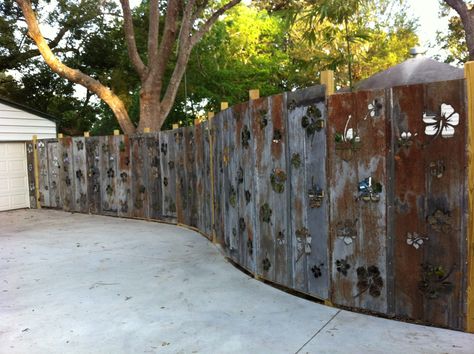 Pinned Image  Industrial Chic- reclaimed 100 year old tin roofing repurposed into a fantasy privacy fence. Tin Roofing, Corrugated Metal Fence, Old Garden Tools, Barn Tin, Garden Fences, Corrugated Metal Roof, Roofing Ideas, Pallet Fence, Old Fences