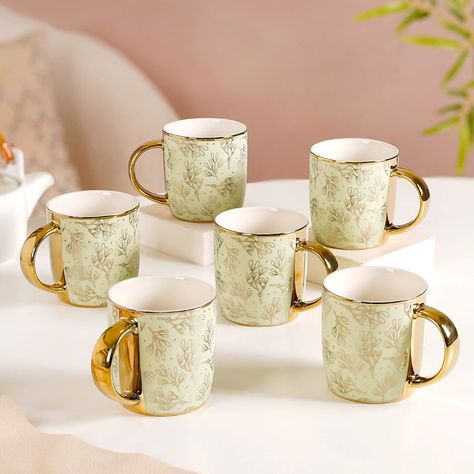 Fill your cup with joy this festive season!☕ Let each sip be a reminder to slow down, to savor the simple pleasures & to find beauty in the everyday.✨ Products included: 1. Luxe Ceramic Floral Teacup Set Of 6 Pink Gold 350ml 2. Matte Mint Gold Floral Coffee Cup Set Of 6 350ml 3. Gold Detail Coffee Mug Set Of 6 Matte Pistachio Green 350ml 4. Luxe Leaf Tea Cup Set Of 6 Navy Blue 250ml 5. Sage Green Hygge Coffee Mug Set Of 6 250ml 6. Cup With Spoon Set Of 6 Glossy Dark Green 350ml 7. Nori Cup... Tea Mug Set, Hygge Coffee, Fill Your Cup, Floral Teacup, Gemstone Tree, Teacup Set, Coffee Mug Set, Mint Gold, Gold C