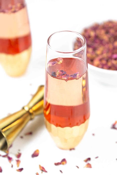 This floral Rose Champagne cocktail makes for a delicious drink for a romantic dinner or any special occasion! Rose Liqueur, Romantic Drinks, Edible Rose Petals, Champagne Recipes Cocktails, Rhubarb Syrup, Edible Roses, Rose Cocktail, Rose Flavored, Champagne Region