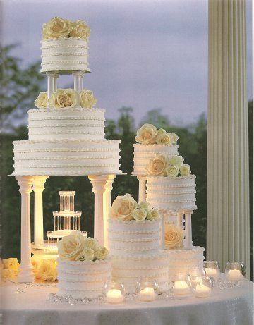 I like this cake a lot... maybe by adding a little blue to bring my colors in a little more and make the cake not so blah Fountain Wedding Cakes, Fountain Cake, Simple Wedding Cake, White Wedding Cake, Elegant Wedding Cakes, Beautiful Wedding Cakes, Tiered Wedding Cake, Wedding Cake Designs, Fancy Cakes