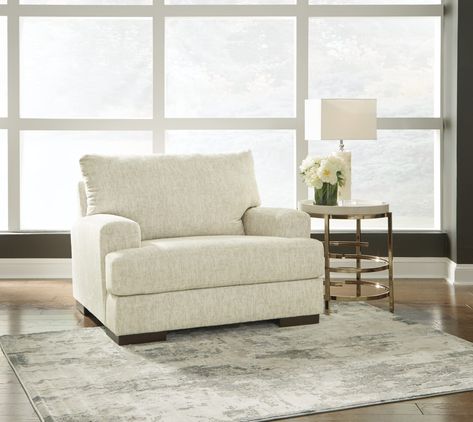 PRICES MAY VARY. OVERSIZED CHAIR: Easy on the eyes and irresistibly comfortable. This chair has a light, neutral hue that blends beautifully with existing living room furniture HANDSOMELY CRAFTED: Corner-blocked frame. Attached back and loose seat cushion. Polyester upholstery. Exposed feet with faux wood finish MODERN CHARACTER: Wide track armrests on this accent chair set a high bar for contemporary style. Plush cushions covered in chenille microfiber cradle you comfortably SPACIOUS SEATING: W Round Swivel Chair, Oversized Chair, Chair And A Half, Living Room Collections, Living Room Set, Arm Chairs Living Room, Loveseat Sofa, Sit Back And Relax, Ashley Furniture