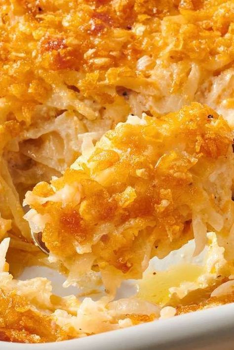 This hash brown casserole is quick and easy comfort food made with oven-baked cheesy potatoes in cream of chicken with a crunchy cornflake topping. Cheesy Hashbrowns With Cornflakes, Potato Casserole Recipes Hash Brown, Hashbrown Casserole Cream Of Mushroom, Hashbrown Casserole Corn Flakes, Hashbrown Casserole No Cream Soup, Hashbrown Casserole With Mushroom Soup, Cheesey Potatoes Casserole Shredded, Best Cheesy Hashbrown Casserole, Shredded Potatoes Casserole