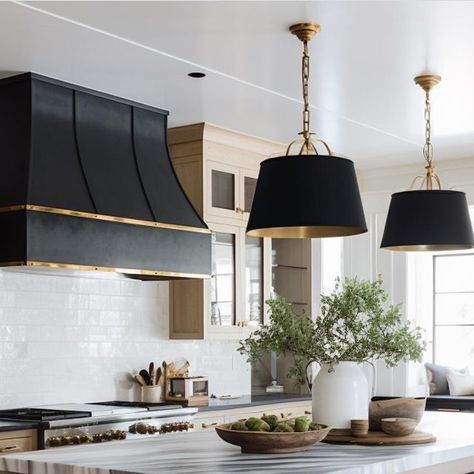 Britt Design Studio on Instagram: "Working on some project concepts - are you team black pendants or white? I love the drama the black adds and how it picks up the deep tone of the hood. WIP // design: @brittdesignstudio" Black Hood Vents Kitchen, Black Kitchen Hood, Black Vent Hood, 2025 Kitchen, Black Pendants, Hood Range, Kitchen Revamp, Cream Cabinets, Lake House Kitchen