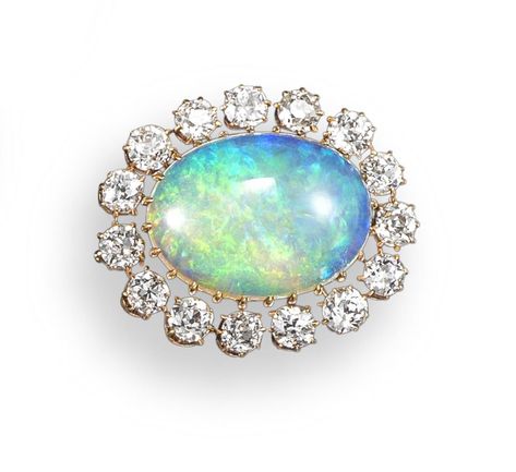 Lot 1286 - An opal and diamond cluster brooch, the oval-shaped opal set within a surround of fifteen old Collectible Oval Opal Jewelry, Vintage Oval Cabochon Opal Jewelry, Opal Multi-stone Fine Jewelry, Vintage Opal Oval Cabochon Jewelry, Opal Brooch Vintage, Handmade Gold Jewellery, Jewelry Auction, Diamond Brooch, Royal Jewels