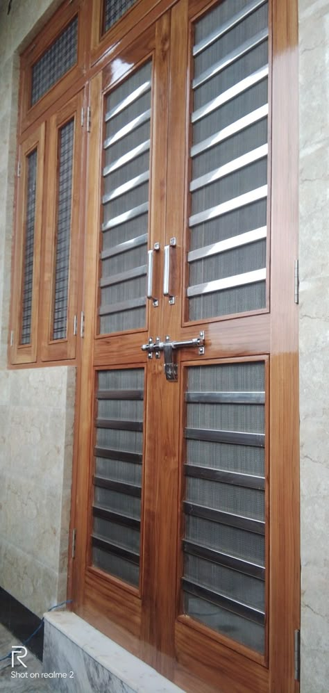 Iron Net Doors For Main Door, Double Door Net Design Wood, Double Door Net Design, Jaali Door Design Wooden Double, Double Door Jali Design, Net Doors For Main Door, Double Door Design Wood Jali, Sunmica Design, Jali Gate