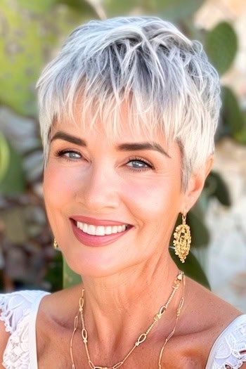 36 Gray Hairstyles For Older Women That Will Make Silver Your Signature Look - The Hairstyle Edit Pixie Hairstyles Over 50, Short White Hair For Older Women, Gray Pixie Haircut Over 50, Short Gray Hair Edgy, Silver Pixie Haircut, Short Hairstyles Older Women, Silver Pixie Cut, Gray Silver Hair, Silver Hair Short