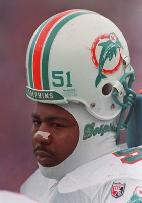 Bryan Cox's outspoken and zany attitude led him to become a journeyman during his NFL career. But before Cox began swapping jerseys so often, he was a sack and tackle machine for the Dolphins. Nfl Football Wallpaper Miami Dolphins, Nfl Dolphins, Nfl Catches, Pro Football Teams, 1972 Miami Dolphins, Sports Illustrated Covers, Miami Dolphins Memes, Miami Dolphins Football, Dolphins Football