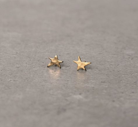 Golden star earrings studs star posts a symmetrical star | Etsy Stack Earrings, Tiny Gold Earrings, Gold Minimalist Jewelry, Unique Studs, Gold Star Earrings, Multiple Earrings, Stud Earrings Unique, Star Dust, Earrings Star