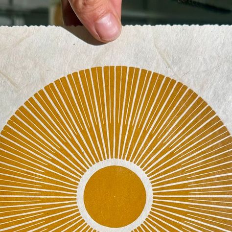 Veskor Cassiopeia on Instagram: "Today I'm starting the second print of the new CENTRAL SUN Autumn Edition in the color yellow ochre on hemp paper. I wish you a beautiful week! 😊🍂   ——— · ——— · ——— · ——— ·  #centralsun #circleart #linoldruck #linoprinting #printmakingart #printmakingprocess #veskorcassiopeia" Color Reduction Linocut, Citrus Linocut, Orange Linocut, Sun Linocut, Sunflower Block Print, The Color Yellow, Hemp Paper, Yellow Ochre, Printmaking Art