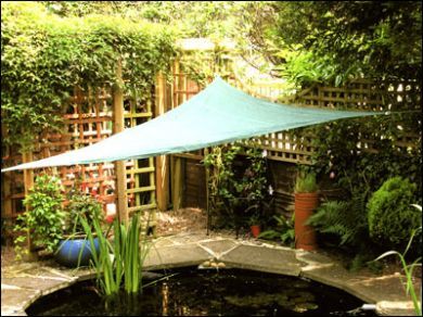 Shading a pond from full sun. Pond Shade Ideas, Pond Shade Cover Ideas, Garden Sail, Ponds Backyard Waterfall, Small Water Gardens, Stone Garden Paths, Turtle Pond, Garden Pond Design, Sun Sail Shade