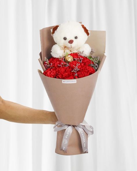 As long as she has a teddy, she'll never feel alone! Make her feel your warmth with this adorable bouquet. Teddy Bouquet, Teddy Love, Ferrero Rocher Chocolate, Rocher Chocolate, Ferrero Rocher Chocolates, Red Carnation, Unique Bouquet, A Teddy Bear, Same Day Flower Delivery