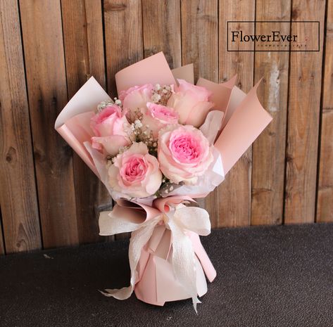 Bouquet of the Day: Mini Pink Bomb 💓 This design features 6 Roselle Roses delicately wrapped in pink paper and finished with a lovely white bow. The Roselle Roses are especially charming when they bloom like this❤️ #NewYorkFlowerShop #BrooklynFlowerShop #ManhattanFlower #FlushingFlower #NewYorkBouquet #FlowerShop #valentinesdayroses #roselleroses White Roses Bouquet, New York Flower, Roses Bouquet, Mini Pink, Pink Paper, White Bow, Rose Bouquet, Beautiful Flower, Diy Flowers