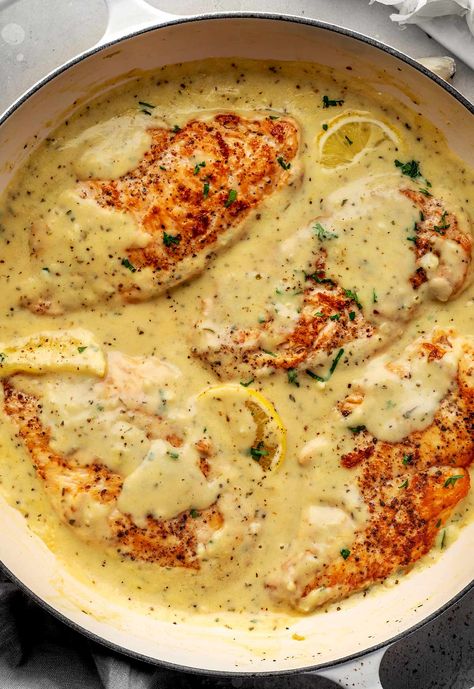 This Creamy Garlic Parmesan Chicken recipe features tender chicken fillets in a rich, creamy sauce made with garlic, fresh Parmesan cheese, and perfect seasonings. Chicken Malibu, Easy Stuffed Chicken Breast Recipes, Creamy Herb Chicken, Easy Stuffed Chicken Breast, Easy Stuffed Chicken, Balsamic Roast, Stuffed Chicken Breast Recipes, Garlic Rosemary Chicken, Chicken Fillet Recipes