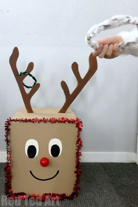 DIY Reindeer Hoop Toss. Make your own Ring Toss Game for Christmas. Perfect for Christmas School Fairs or Family Christmas Day Patry games #christmas #games #schoolfairs #ringtoss Christmas Kids Activities Games, School Xmas Fair Games, Christmas Fayre Ideas School Games, Inflatable Reindeer Antler Ring Toss Game, Christmas Party Diy Ideas, Christmas Reindeer Antler Ring Toss Game, Reindeer Ring Toss Game Diy, Reindeer Ring Toss Game, Xmas Decs Ideas