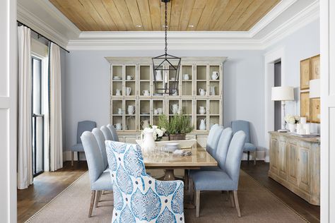 A tongue-and-groove cypress ceiling adds rusticity to the casually elegant dining room. Tray Ceiling Living Room, Tray Ceiling Ideas, Distressed Wood Furniture, Blue Grey Walls, Coastal Farmhouse Style, Built In Banquette, Coastal Farmhouse Decor, White Shiplap Wall, Home Design Magazines