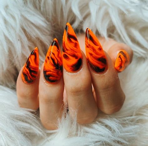 Orange Stilleto Nails Long, Halloween Marble Nails, Orange Stiletto Nails Designs, Orange And Black Nails Acrylic, Nails Black And Orange, Red And Orange Nails, Orange Stiletto Nails, Orange Marble Nails, Black And Orange Nails