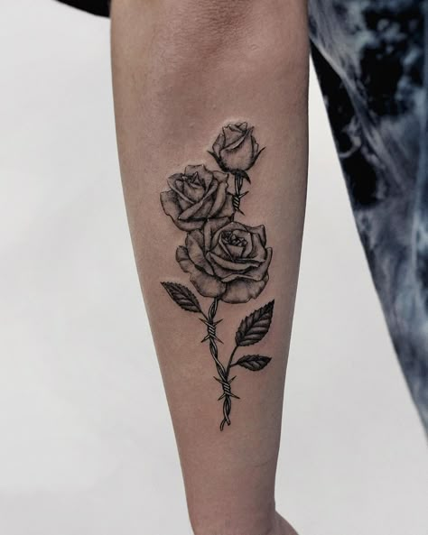 Tattoo of roses with barbed wire stem. Black and grey, detailed, fineline, microrealism tattoo. Rose And Barbed Wire, Tatoo Rose, Barbed Wire Tattoo, Wire Tattoo, Rose Tattoo Stencil, Barbed Wire Tattoos, Rose Tattoo Meaning, Rose Hand Tattoo, Rose Tattoos For Men