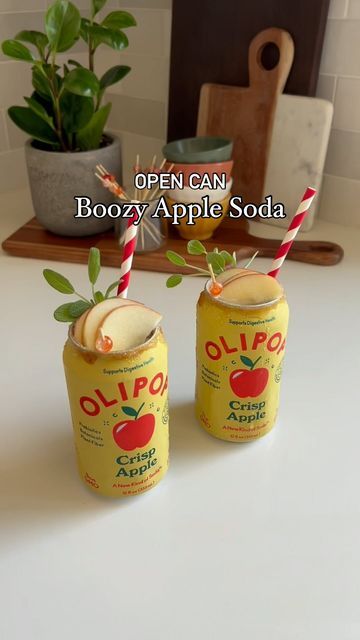 Amanda Hernandez on Instagram: "You need to make this for fall 🍎  Olipop crisp apple is back! This is a seasonal flavor and it is one of my favorites so I knew I had to make an open can cocktail with it!   This turned out even better than I thought it would. You can adjust measurements based on how sweet or strong you want it.   Here is what I did for one can:   Olipop crisp apple  2 oz. Tito’s vodka  1 tablespoon caramel - I used Trader Joe’s  Caramel and sugar to rim the can  Apple slices and sage for garnish   Open the olipop and pour into a glass. Add 1 tablespoon of caramel to a shaker (I recommend melting the caramel a little in the microwave) and then pour in 2 ounces of vodka. Give it a good stir then add ice and shake it.   Rim the can with caramel (slightly melted works best) th Apple Crisp Cocktail, Olipop Cocktail Recipe, Carmel Apple Vodka Recipes, Carmel Apple Vodka Punch, Carmel Apple Drink Alcohol Fall, Open Can Cocktail, How To Make Carmel, Caramel Apple Sucker Cocktail, Caramel Apple Drink Vodka