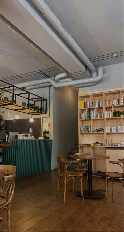 Bookshelf In Coffee Shop, Coffee Shop With Books Aesthetic, Small Book Cafe Interior Design, British Cafe Aesthetic, Book Cafe Ideas Coffee Shop, Coffee Shop Bookshelf, Books And Coffee Shop, Book Coffee Shop Aesthetic, Library And Coffee Shop