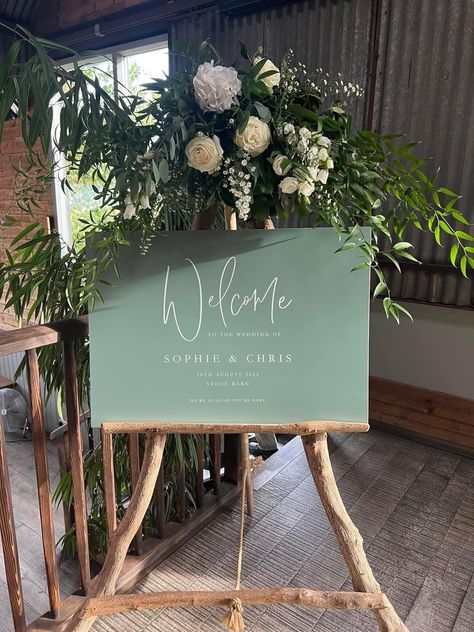 Make a stunning first impression on your wedding day with our custom-designed wedding welcome sign. This elegant piece serves as a beautiful introduction to your celebration, setting the tone for a day filled with love and joy. 🌿 Features: Personalised with your names and wedding date High-quality craftsmanship for a timeless look Choose from various design styles to match your theme Sturdy and durable materials for indoor or outdoor use PLEASE NOTE: Easel not included. 💖 Matching Items: In ne Wedding Theme Greenery, Sage Green And Blush Wedding Welcome Sign, Sage Green Wedding Centre Pieces, Sage Green Wedding Theme Indoor, Summer Green Wedding Theme, Green Wedding Venue Decor, Sage Wedding Reception Decor, Sage Rustic Wedding Theme, Wedding Venue Sage Green