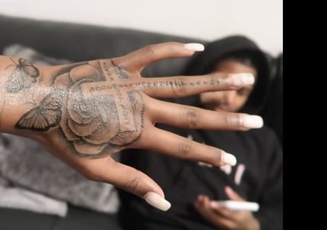 Black Women Hand Tattoos Ideas, Skeleton Hand Tattoos Black Women, Brooklyn Frost Hand Tattoo, Brooklyn Hand Tattoo, Girl Hand Tattoos Ideas Black, Butterfly Hand Tattoo Black Women, Dope Hand Tattoos For Women, Rhianna Hand Tat, Stomach Tattoos Women