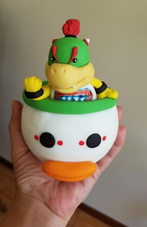 Bowser Jr cake topper! by Jenn Szebeledy  ( Cakeartbyjenn_ ) - http://cakesdecor.com/cakes/333576-bowser-jr-cake-topper Bowser Jr Birthday Cake, Bowser Jr Birthday Party, Mario Bowser Cake, Bowser Cake, Nintendo Birthday, Male Cakes, Bowser Jr, Mario Cake, Harry Birthday