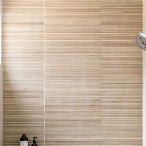 Any shower can feel like an oasis with the use of tile that looks like teak. Notice the shampoo ledge as well. The shampoo ledge not only... | Instagram Shampoo Ledge, Oasis, Teak, Feel Like, Tile, That Look, Shower, Canning, Instagram