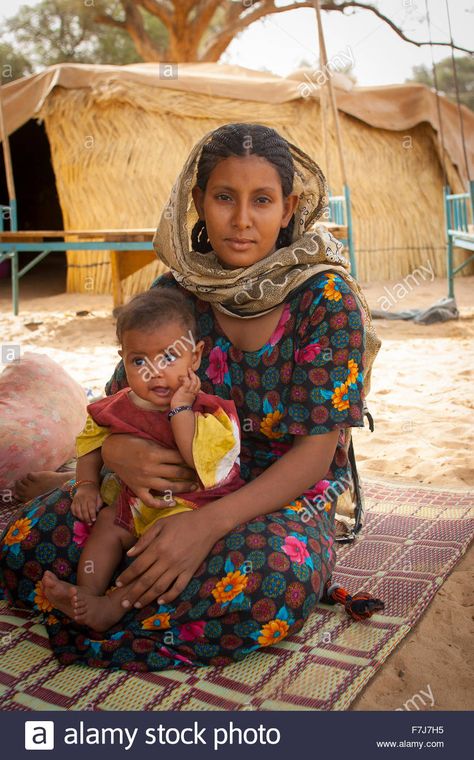 African Woman & Child Stock Photo, Royalty Free Image: 90755537 - Alamy Desert Sahara, The Sahara Desert, Sahara Desert, Instagram Tags, Rural Area, Libya, Free Image, The Desert, Royalty Free Images