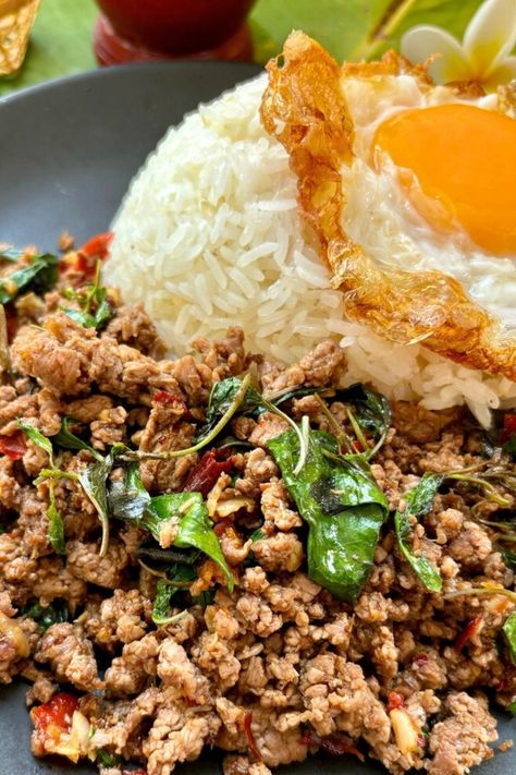 This Thai basil beef recipe makes a spicy stir-fry that's perfect for a quick, easy, and healthy dinner. It's low-carb, perfect for a keto diet, and it's common street food that can be customized to your taste. Spicy Thai Food Recipes, Thai Basil Beef Recipe, Thai Basil Recipes, Basil Beef, Traditional Thai Food, Thai Dinner, Thai Basil Beef, Thai Recipes Noodles, Thai Stir Fry