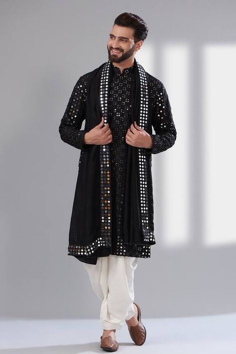 Black mandarin collar kurta with thread and mirror embroidery all over. Paired with a mirror work stole and a pant. - Aza Fashions Black Mirror Work Kurta For Men, Black Mirror Kurta Men, Garba Night Outfit For Men, Black Sangeet Outfit Men, Kurti Designs Latest For Men, Sufi Night Outfit For Men, Wedding Kurta For Men Style, Navratri Kurta For Men, Mens Kurta Designs Latest