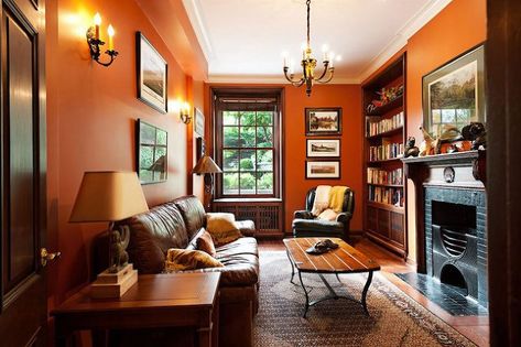 David Giral Photography - stained wood trim - Benjamin Moore Racing Orange red Stained Wood Trim, Dark Wood Trim, Best Wall Colors, Neutral Wall Colors, Traditional Family Room, Orange Rooms, Living Room Orange, Orange Walls, Retro Interior