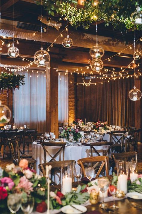 rustic chic wedding reception with open beams and floating terrarium candles Floral Chuppah, Chic Wedding Reception, Candlelit Wedding, Blue Wedding Dress, Industrial Chic Wedding, Indoor Wedding Receptions, Decoration Evenementielle, February Wedding, Rustic Wedding Reception