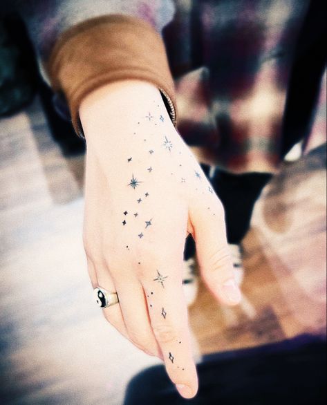 Constellation Bracelet Tattoo, Constellation Tattoo Aesthetic, Astronomy Hand Tattoo, Colorful Constellation Tattoo, Perseus Constellation Tattoo, Andromeda Constellation Tattoo, Tattoo Star Constellation, Cup Of Stars Tattoo, Draco Constellation Tattoo