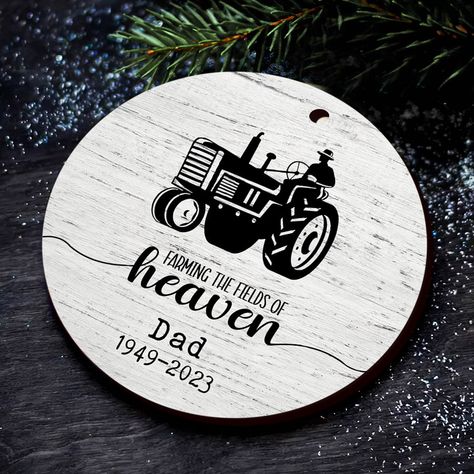 Honor precious memories with the meaningful farming in heaven ornament | in memory of dad ornaments. As the holidays approach, it's common to feel the absence of loved ones no longer with us. However, keeping their spirit close helps bring comfort during this reflective season. Come and check out our Memorial Ornaments for the perfect Personalized Christmas Ornaments to warm up your loved ones this holiday.Studies show that acknowledging grief through mementos aids the healing process. Giving th Remembrance Ornaments, Heaven Chair, Fishing In Heaven, Heaven Ornament, Christmas In Heaven, In Remembrance, Fishing Diy, In Memory Of Dad, Memorial Ornaments