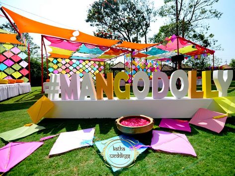 New Age Wedding Decor Ideas! | Weddingplz Holi Event Decor Ideas, Holi Party Decoration Decorating Ideas, Holi Event Decor, College Fest Decoration Ideas Outdoor, Selfie Point Ideas, Diy Kite Decorations, All White Decor, Food Festivals Event, Carnival Wedding Theme