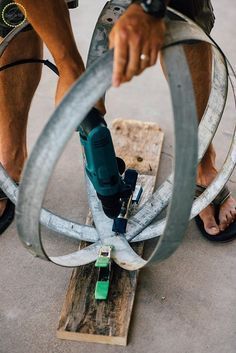 Here is a fun and easy craft to add some zest to your garden (or really anywhere in your home). Simply grab some old wine barrel rings and you can add some industrial rustic edge to your space. I snagged these rings at the swap meet for pretty inexpensive but you can also find them online on Craigslist pretty often too. You can even buy a wine barrel and that is a whole barrel of crafts that will certainly keep you busy!! I made a few of these and placed them around the entry to our ho… Wine Barrel Diy, Wine Barrel Garden, Garden Diy Decoration Ideas, Rustic Outdoor Lighting, Barrels Diy, Wine Barrel Rings, The Swap, Swap Meet, Rustic Wood Furniture