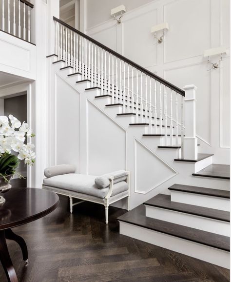 Dark Stained Wood Floors, Staircase Molding, White Marble Tile Floor, Wrought Iron Railings, Entry Area, White Staircase, Luxury Staircase, French Bench, Entry Room